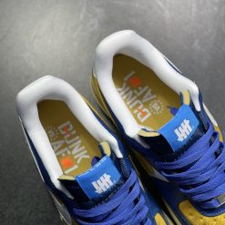 Nike Air Force 1 Low SP Undefeated –Xanh Vàng